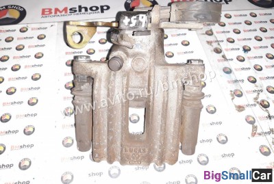 Суппорт задний левый Volkswagen (WV) Passat b5