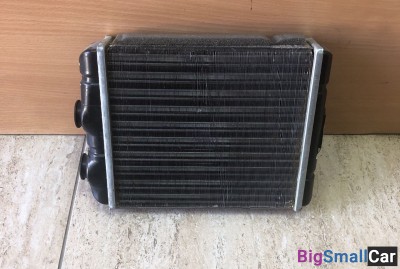 Радиатор печи Astra H / G склад16